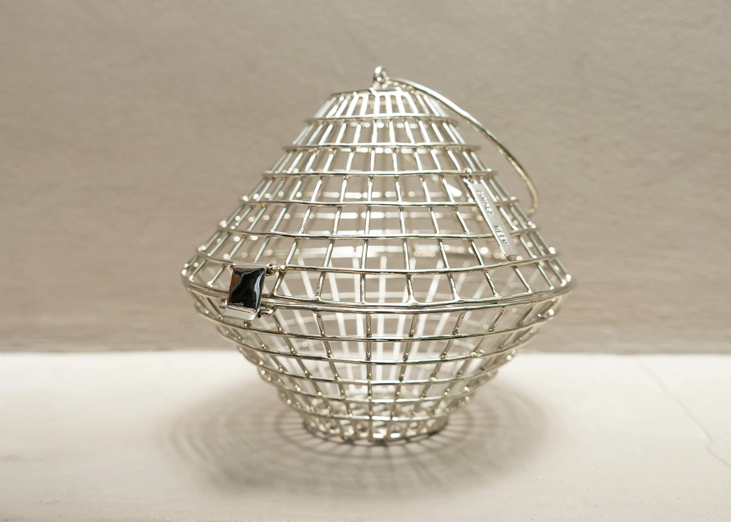 Clam Shell Cage Bag