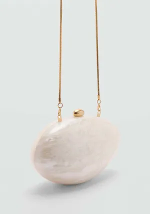 Pearl-effect clutch bag