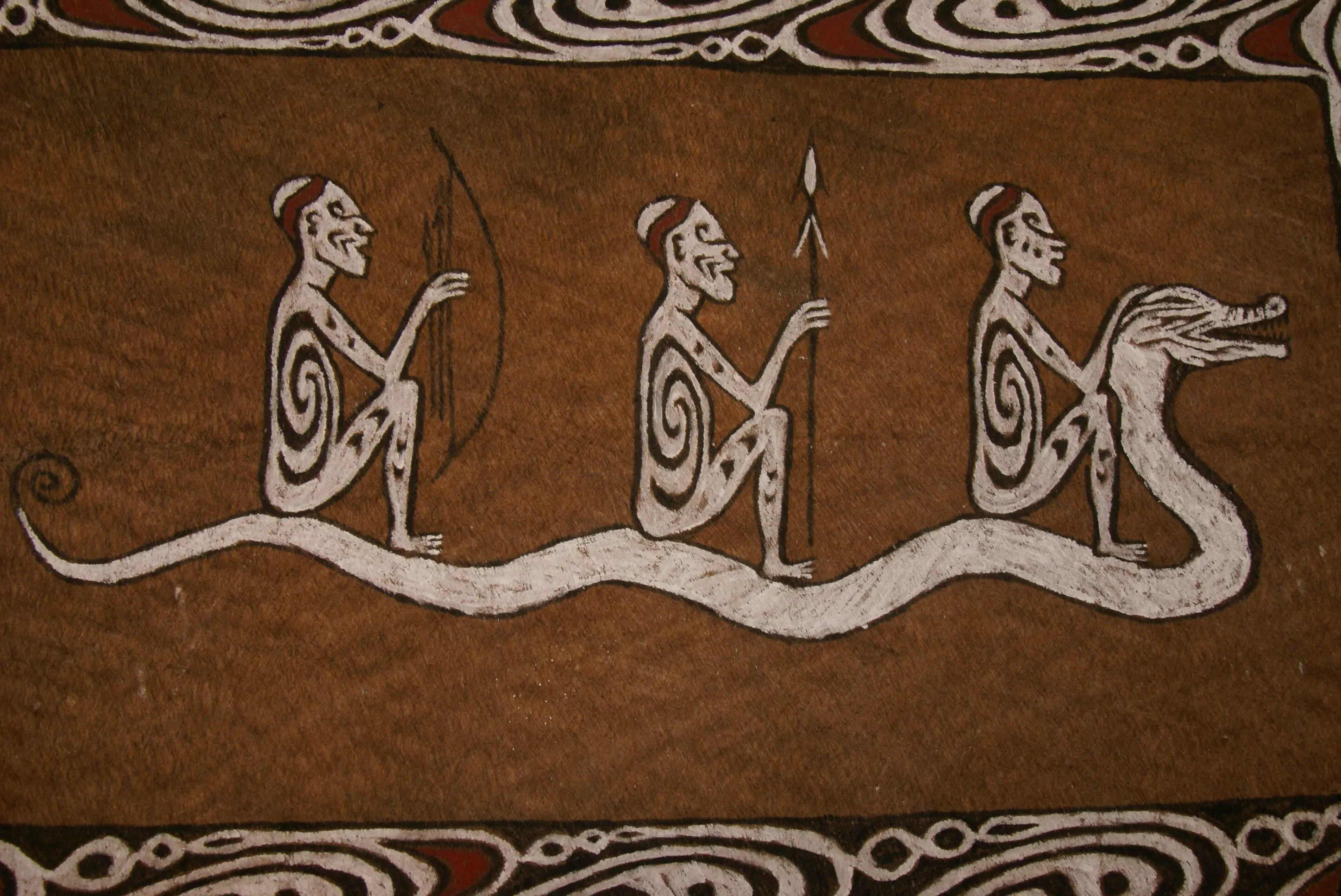 Rare Maro Tapa loin Bark Cloth (Kapa in Hawaii), from Lake Sentani, Irian Jaya, Papua New Guinea. Hand painted by a Tribal Artist with natural pigments: Spiritual Stylized Fish Motifs & waves 36 1/2" x 23" (no 8)