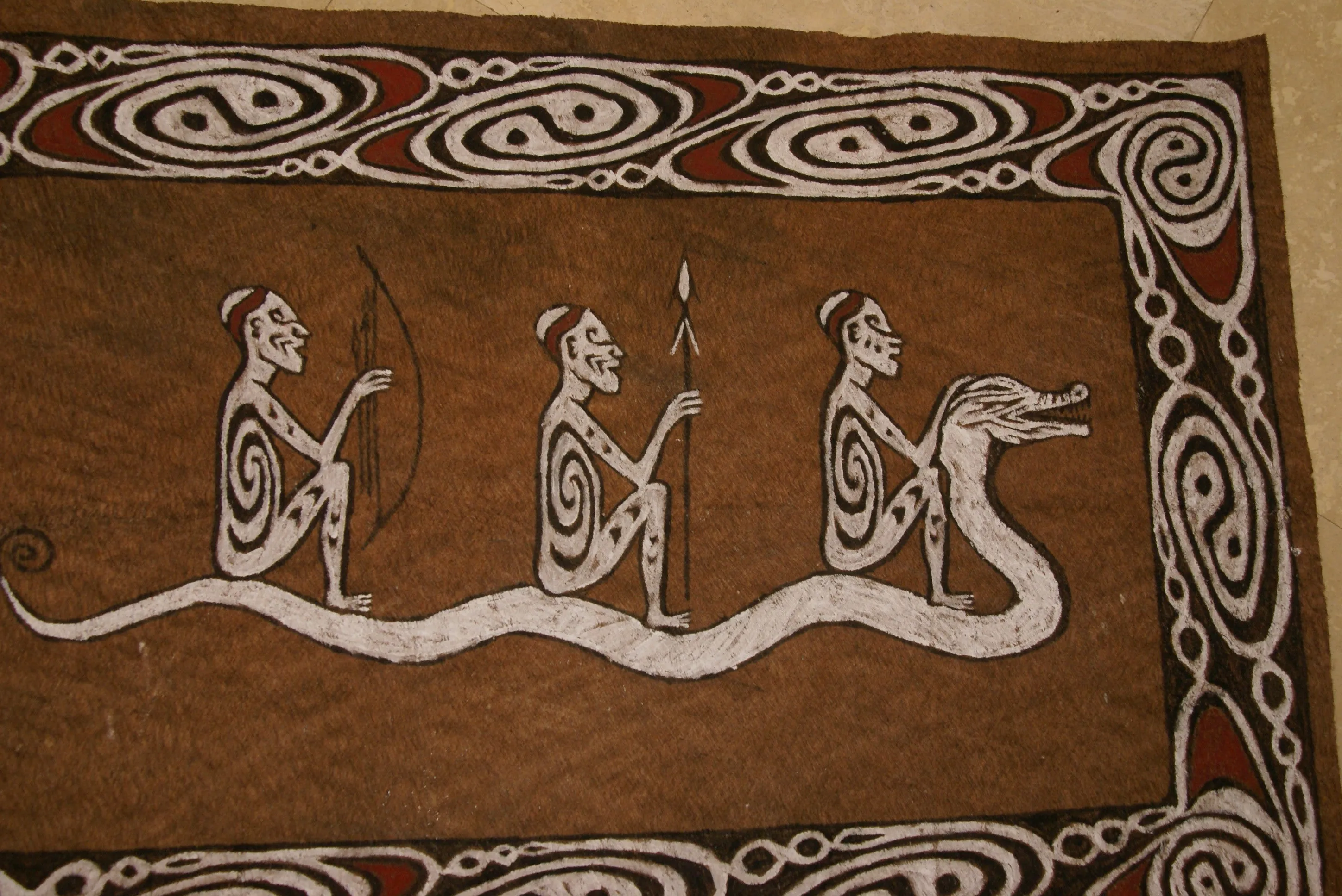 Rare Maro Tapa loin Bark Cloth (Kapa in Hawaii), from Lake Sentani, Irian Jaya, Papua New Guinea. Hand painted by a Tribal Artist with natural pigments: Spiritual Stylized Fish Motifs & waves 36 1/2" x 23" (no 8)