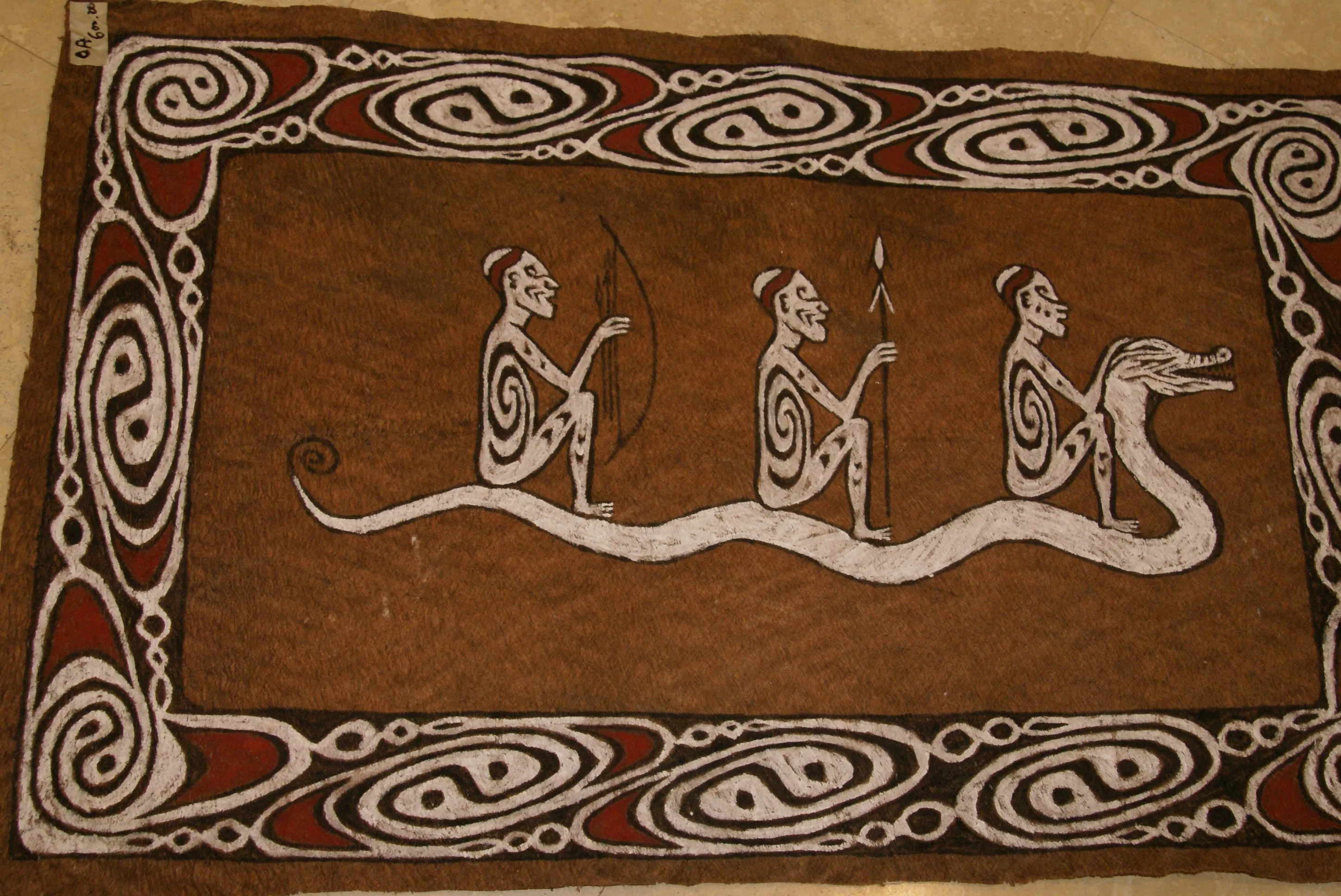 Rare Maro Tapa loin Bark Cloth (Kapa in Hawaii), from Lake Sentani, Irian Jaya, Papua New Guinea. Hand painted by a Tribal Artist with natural pigments: Spiritual Stylized Fish Motifs & waves 36 1/2" x 23" (no 8)