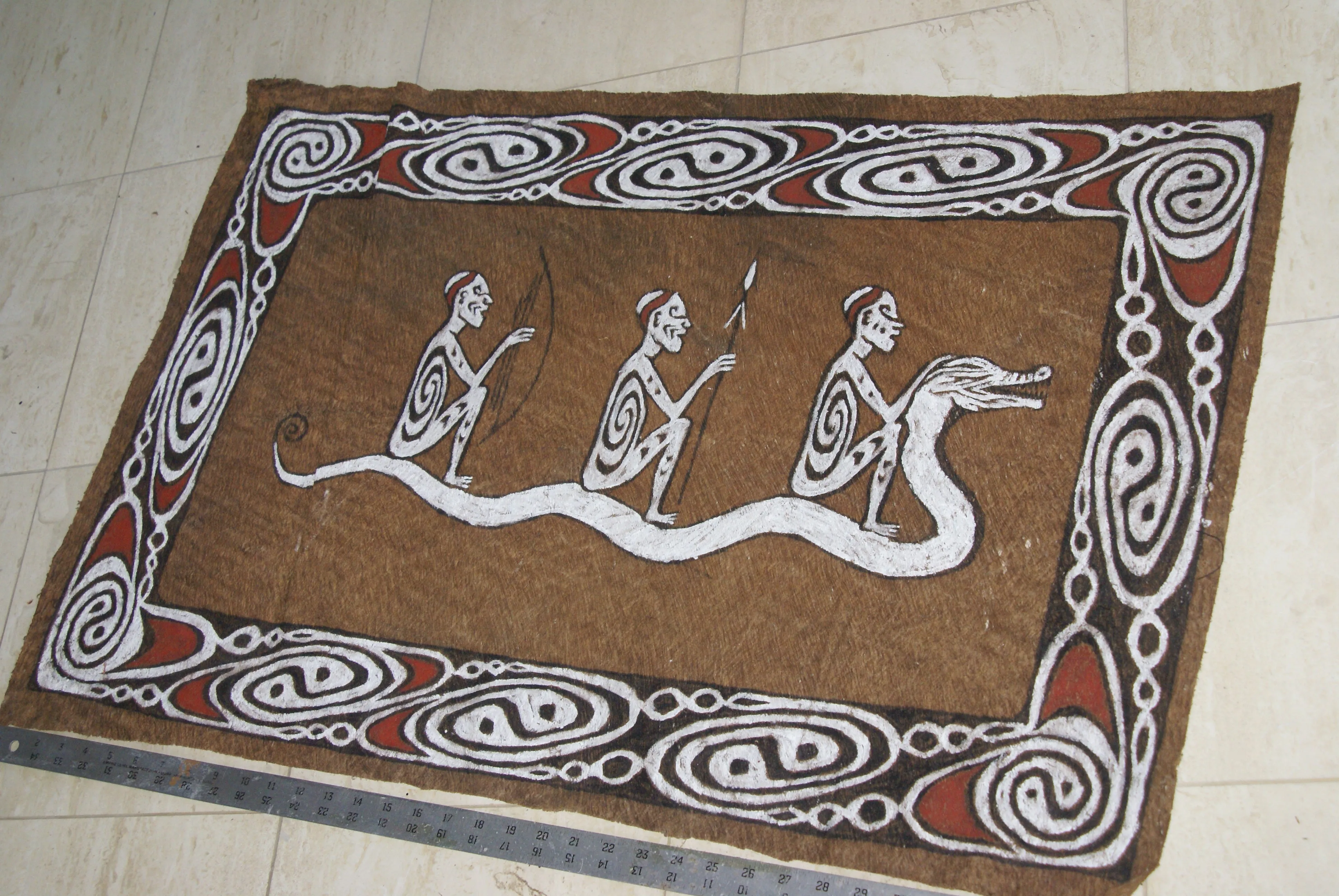 Rare Maro Tapa loin Bark Cloth (Kapa in Hawaii), from Lake Sentani, Irian Jaya, Papua New Guinea. Hand painted by a Tribal Artist with natural pigments: Spiritual Stylized Fish Motifs & waves 36 1/2" x 23" (no 8)