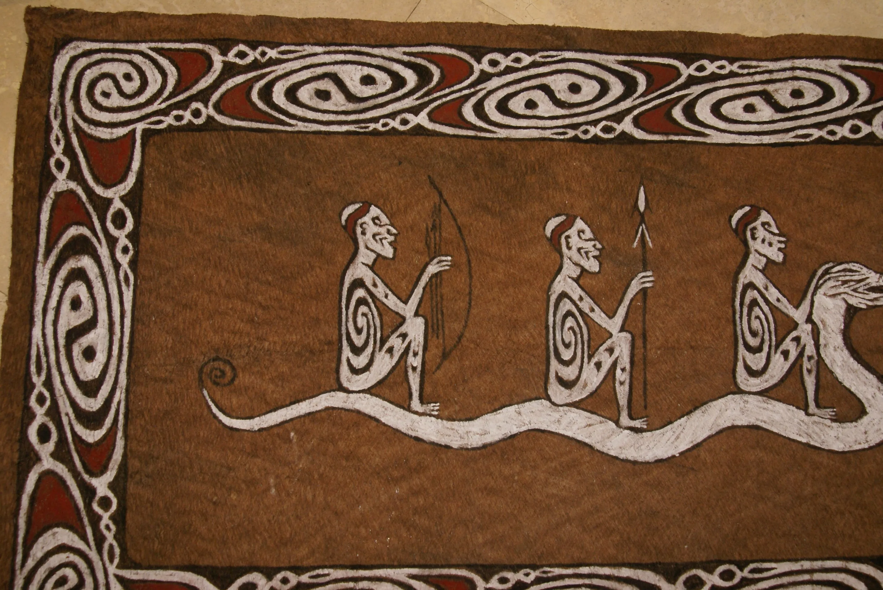 Rare Maro Tapa loin Bark Cloth (Kapa in Hawaii), from Lake Sentani, Irian Jaya, Papua New Guinea. Hand painted by a Tribal Artist with natural pigments: Spiritual Stylized Fish Motifs & waves 36 1/2" x 23" (no 8)