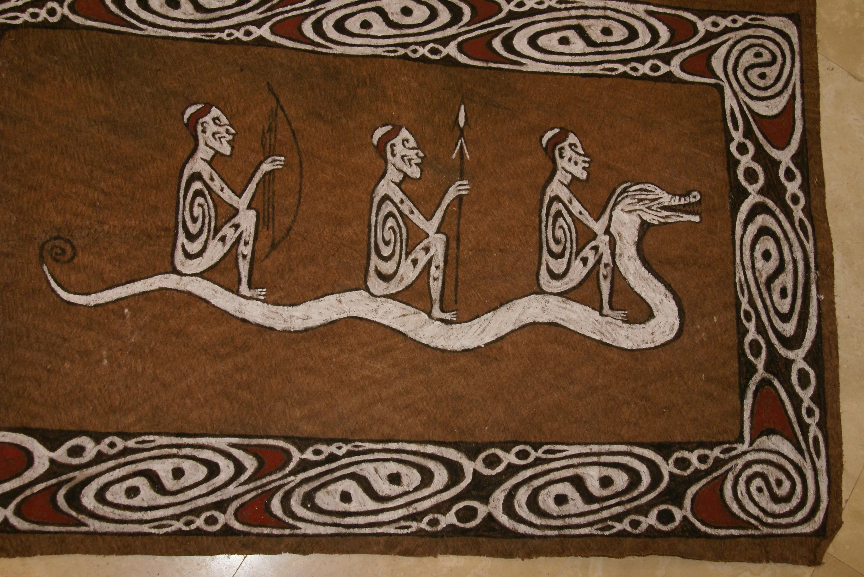 Rare Maro Tapa loin Bark Cloth (Kapa in Hawaii), from Lake Sentani, Irian Jaya, Papua New Guinea. Hand painted by a Tribal Artist with natural pigments: Spiritual Stylized Fish Motifs & waves 36 1/2" x 23" (no 8)