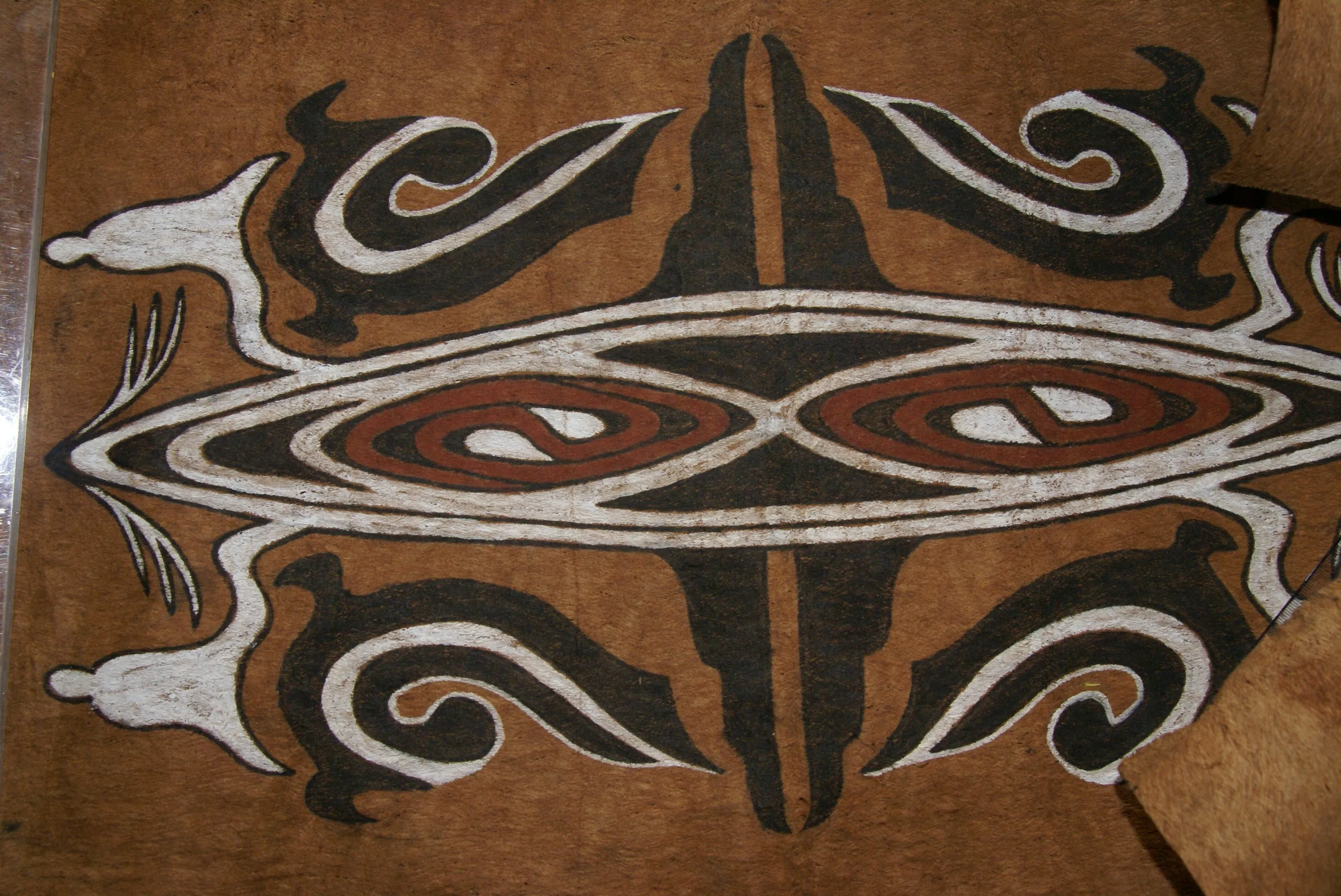 Rare Tapa Bark Cloth (Kapa in Hawaii), from Lake Sentani, Irian Jaya, Papua New Guinea. Hand painted by a Tribal Artist with natural pigments: Spiritual Stylized Shield Motifs 23" x 18" (no 13)