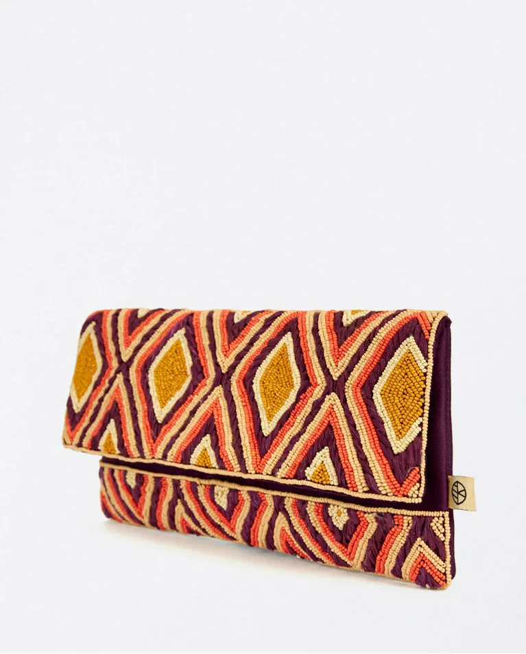 SURKANA <BR>
Beaded and raffia clutch bag <BR>
Maroon <BR>