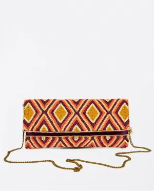 SURKANA <BR>
Beaded and raffia clutch bag <BR>
Maroon <BR>