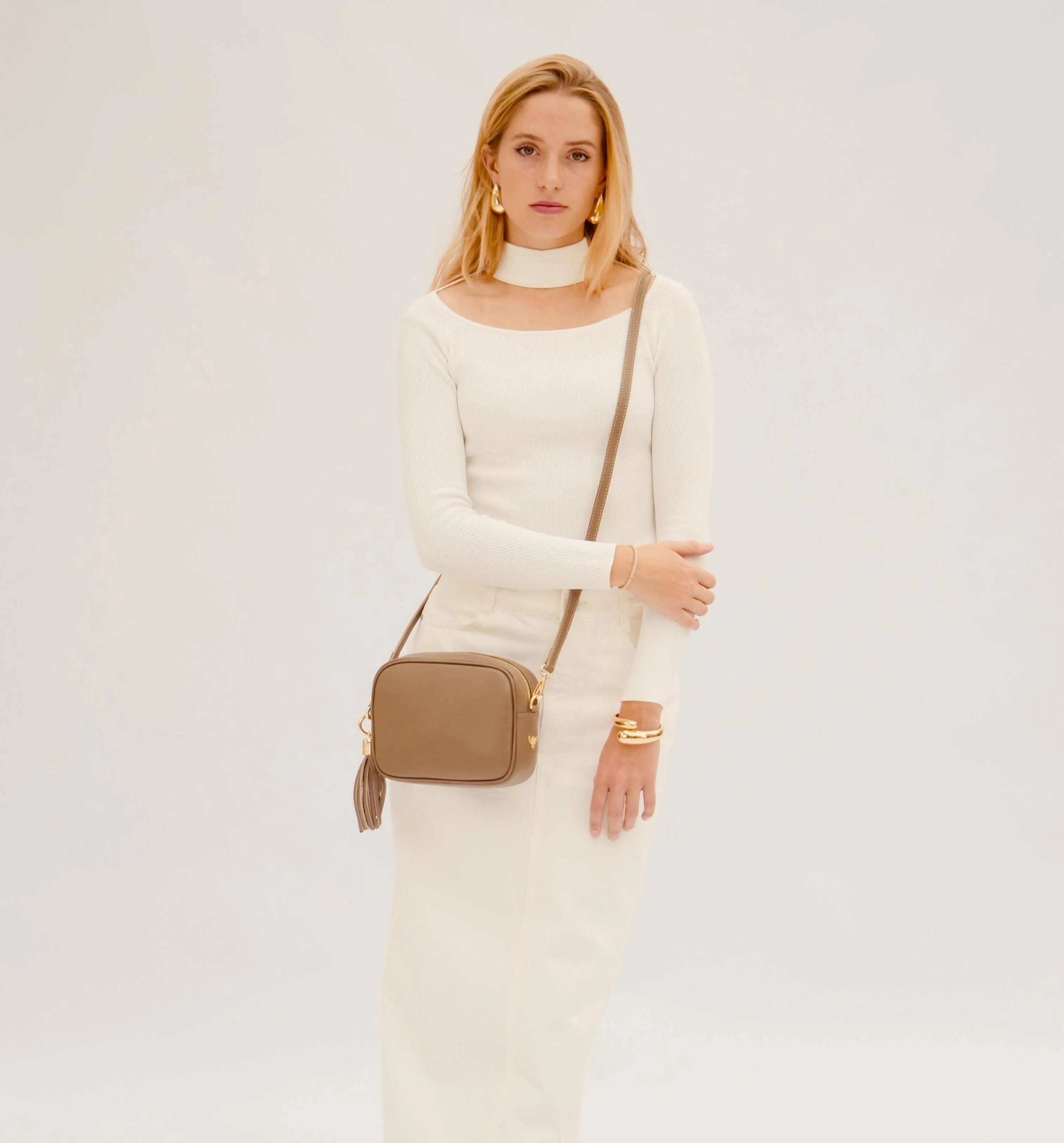 The Tassel Latte Leather Crossbody Bag With Latte Stripe Strap