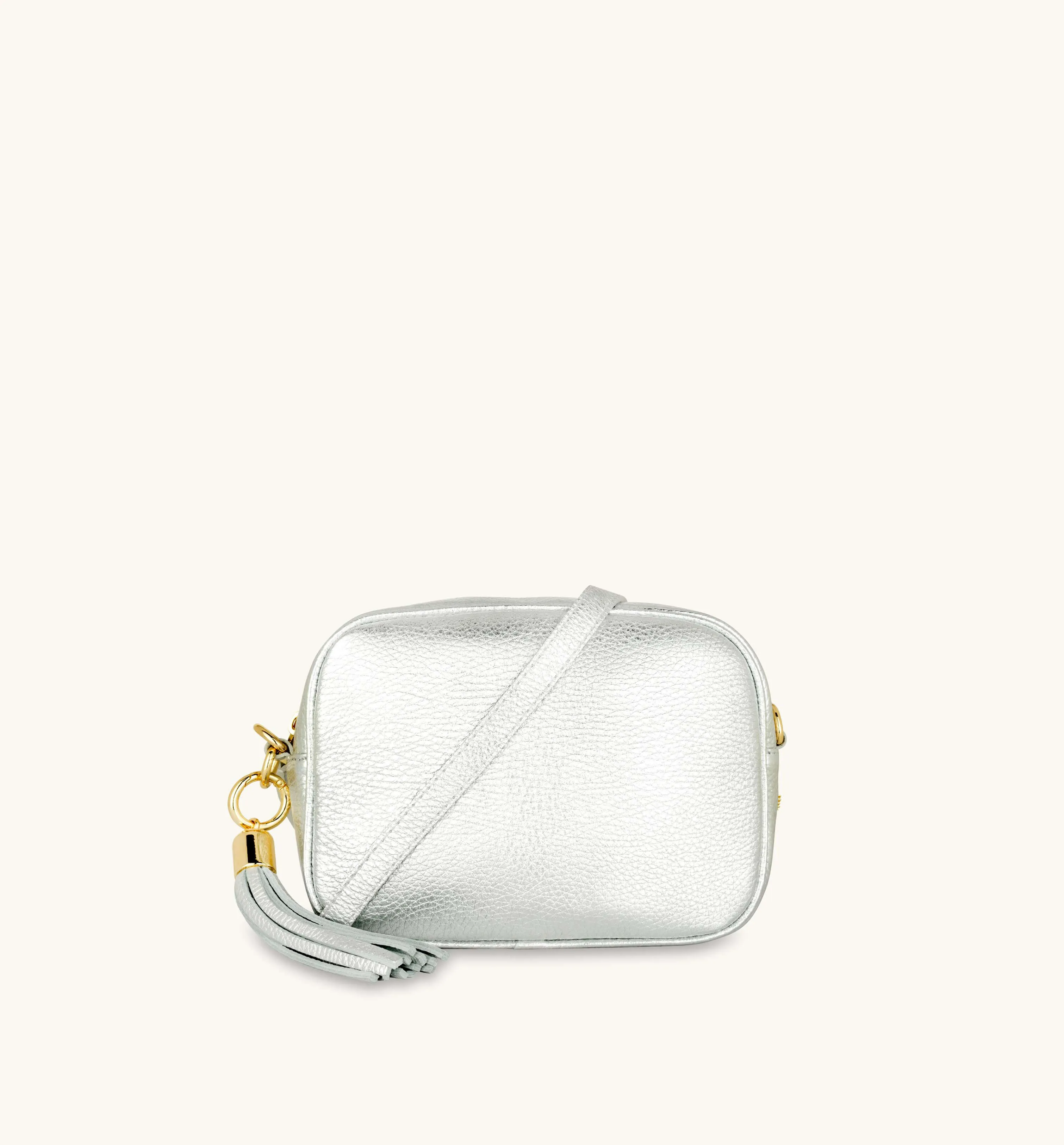 The Tassel Silver Leather Crossbody Bag With Black & Silver Chevron Strap