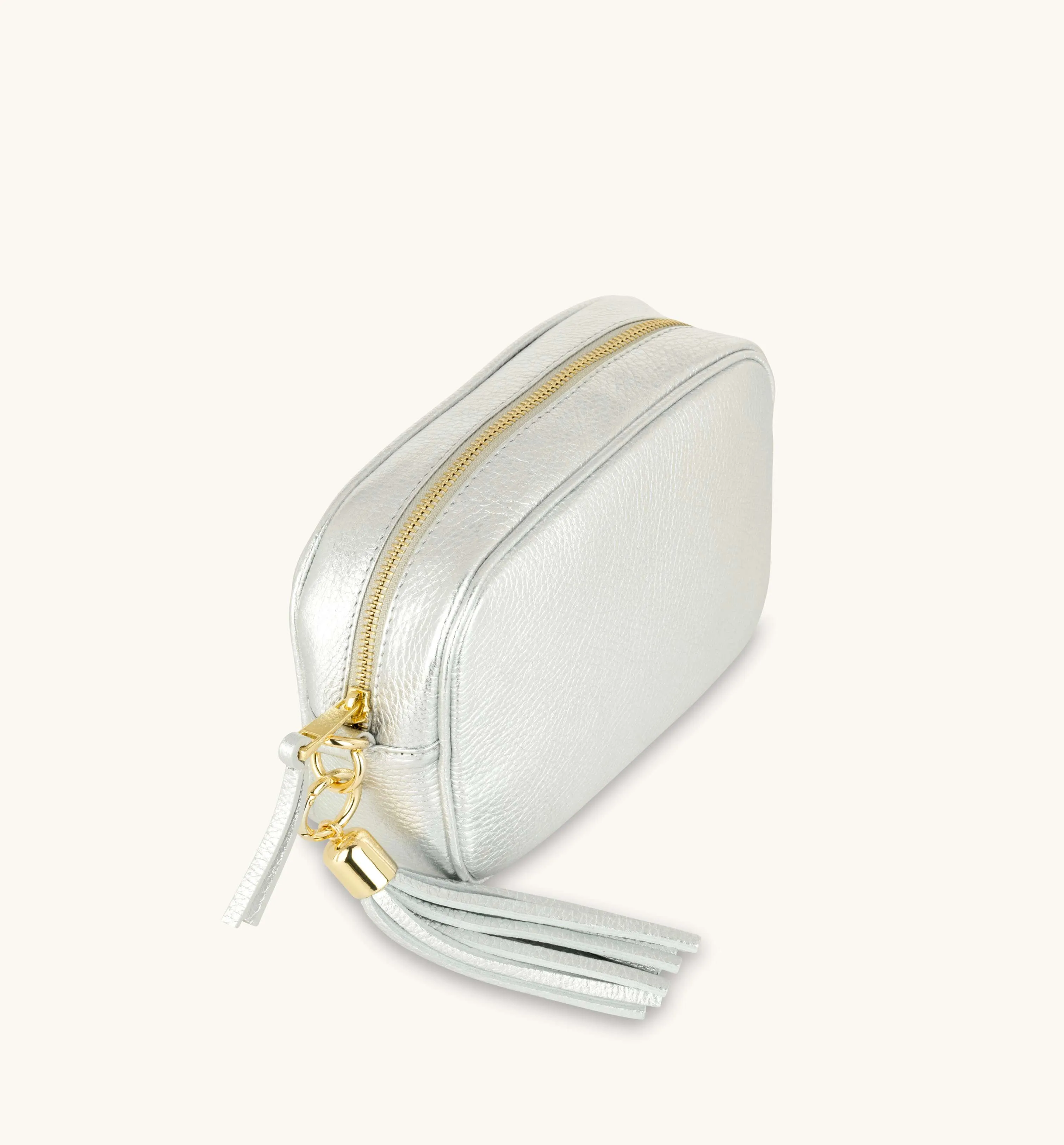 The Tassel Silver Leather Crossbody Bag With Black & Silver Chevron Strap