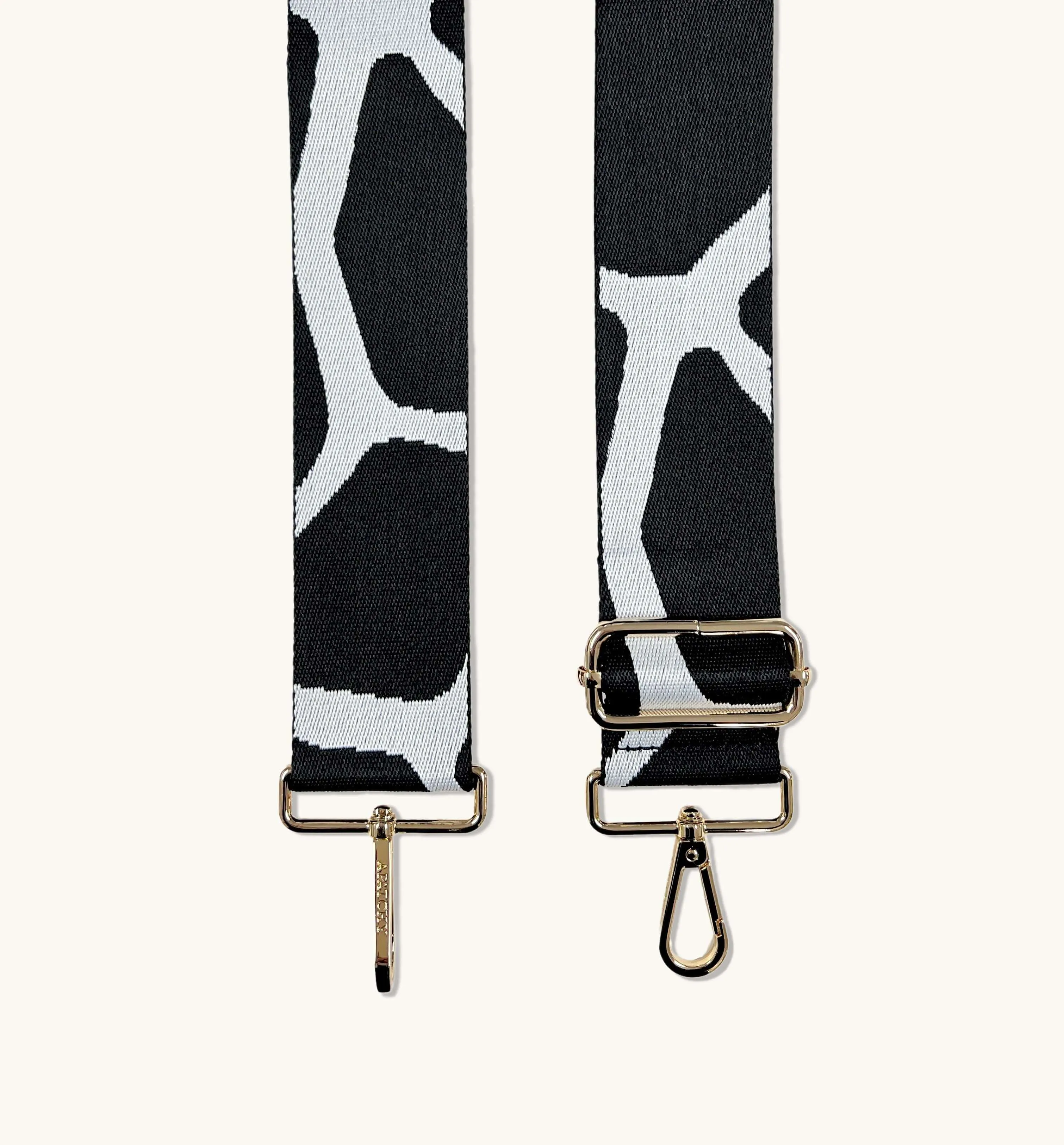 The Tassel White Leather Crossbody Bag With Black & White Giraffe Strap