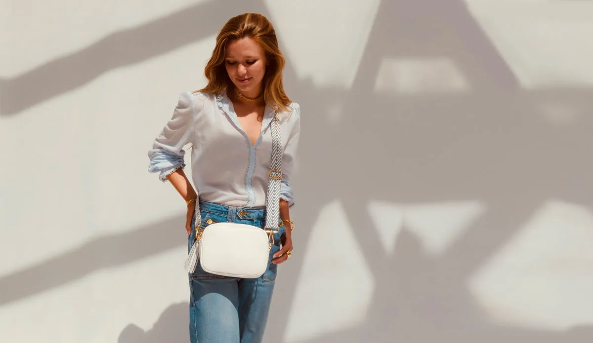 The Tassel White Leather Crossbody Bag With Black & White Giraffe Strap