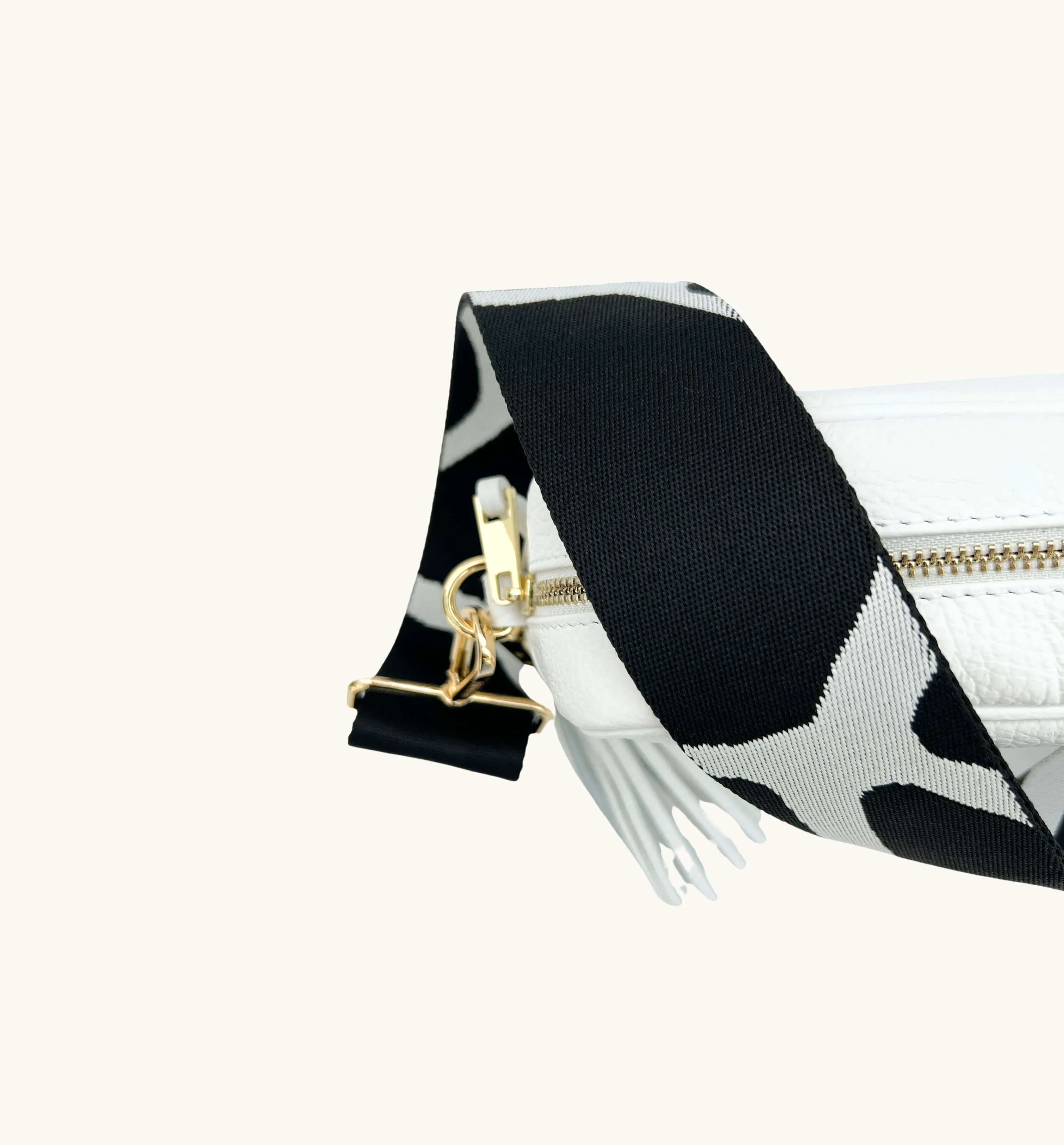 The Tassel White Leather Crossbody Bag With Black & White Giraffe Strap