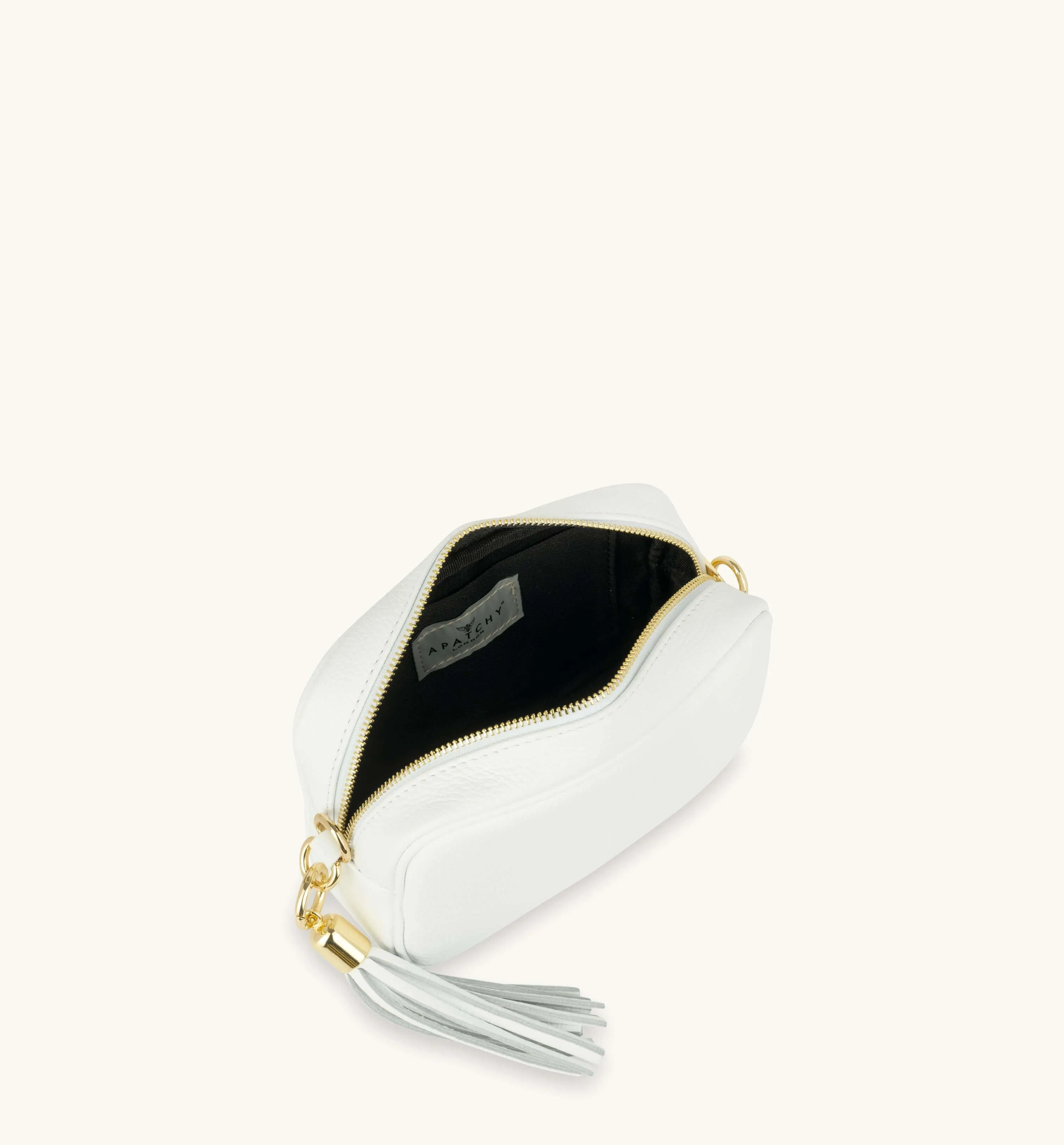 The Tassel White Leather Crossbody Bag With Black & White Giraffe Strap